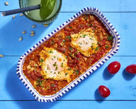 Shakshouka aux œufs coulants et persil frais